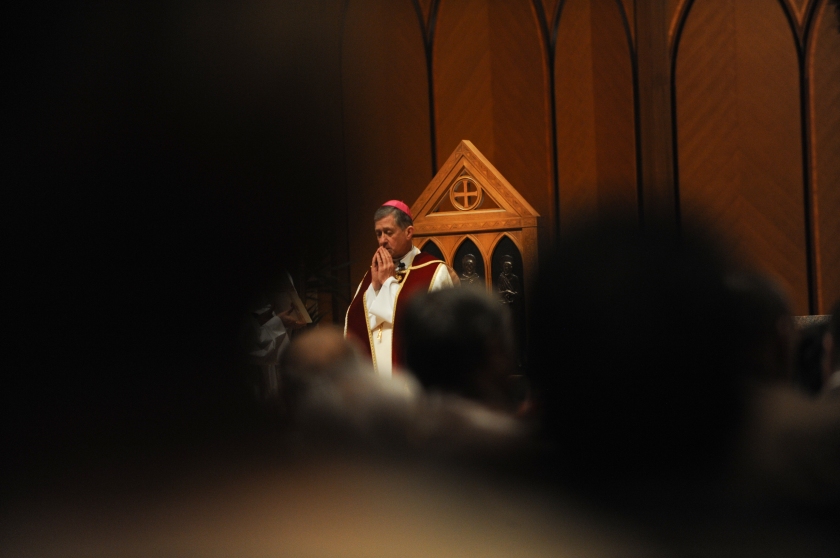 Archbishop Blase Cupich prays at the conclusion of evening prayer or vespers the day after his installation ceremony at Holy Name Cathedral in Chicago, Illinois on November 19, 2014.  Cupich is the ninth Archbishop of Chicago and succeeds Cardinal Francis George.